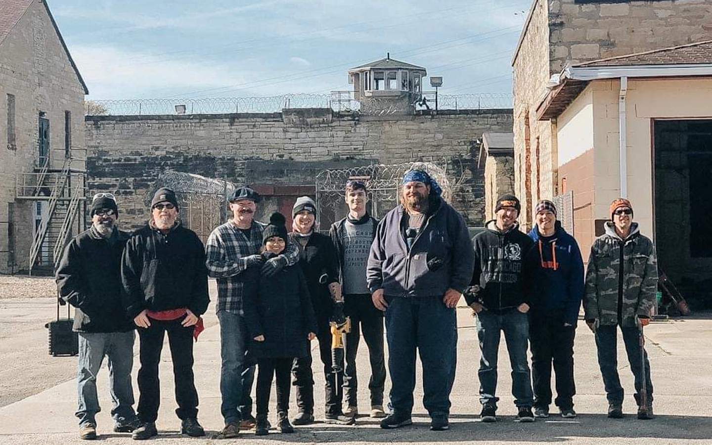 Roosevelt University alum Michael Kucynda, far left, with the other members of the Saturday Squad at Old Joliet Prison.
