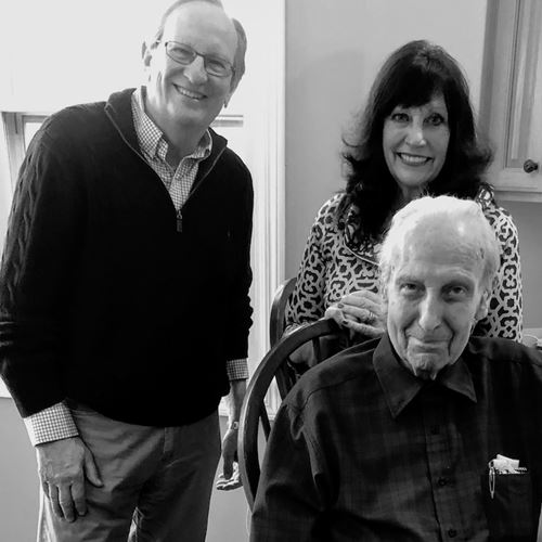 alt="Roosevelt alum Edward Knaggs (seated) with Kathleen Miller (right) and her brother"