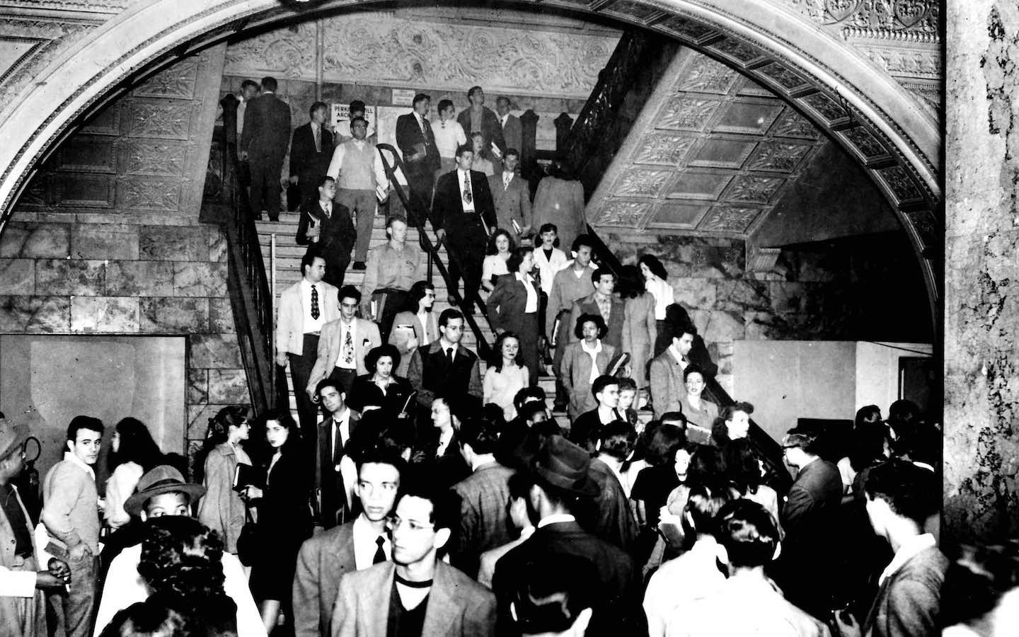 Some of Roosevelt's first students head to class in the Auditorium Building