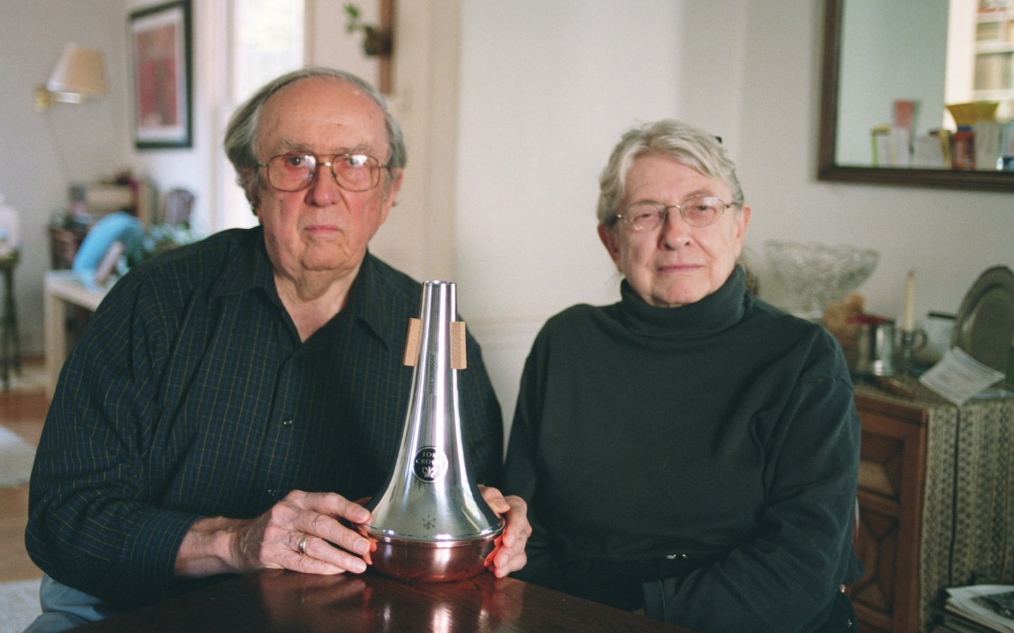 Thomas and Donna Crown with a brass instrument mute