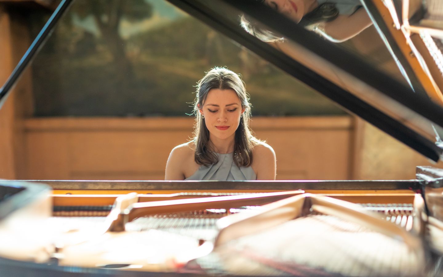 Student playing piano