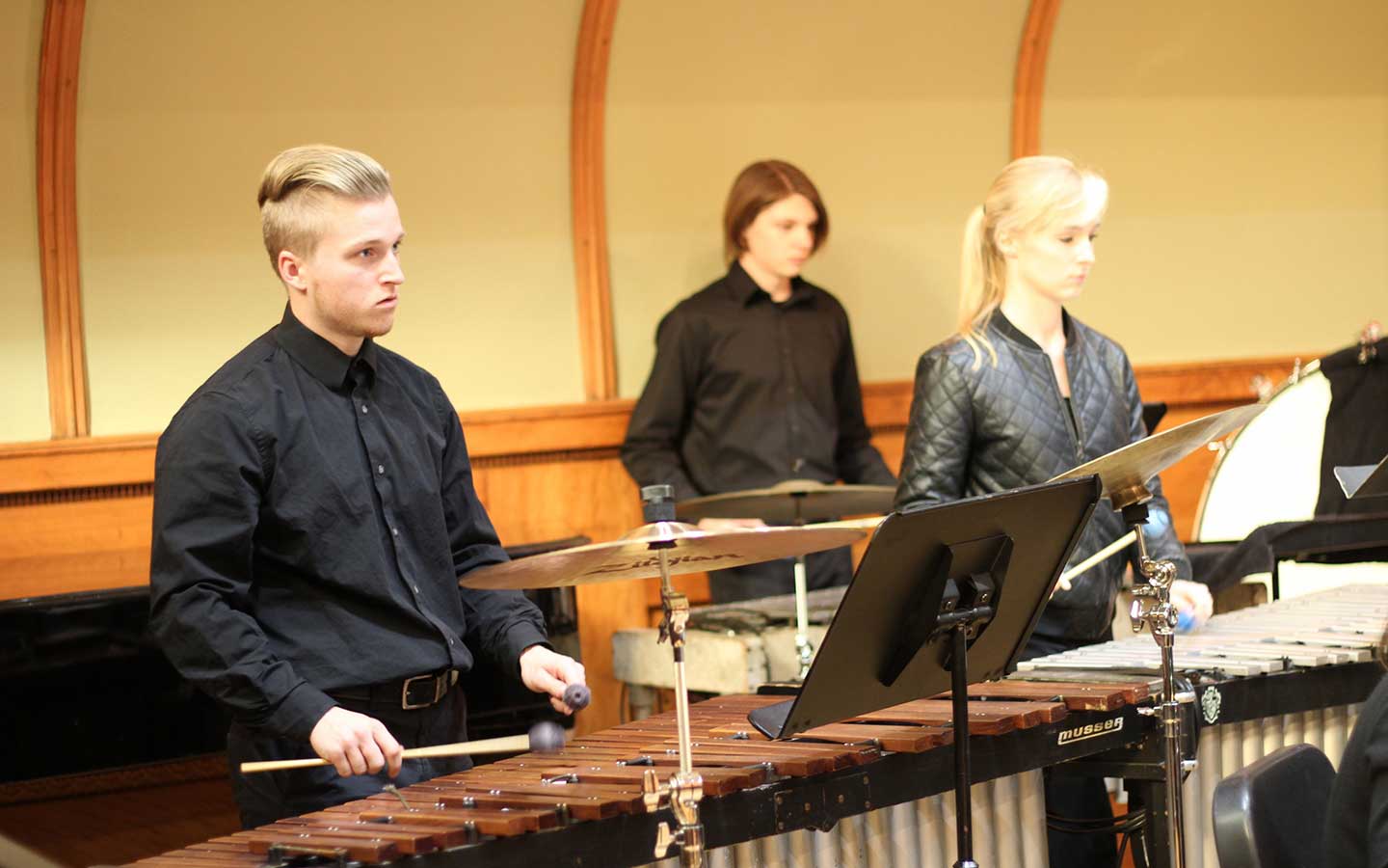 students playing percussion instruments