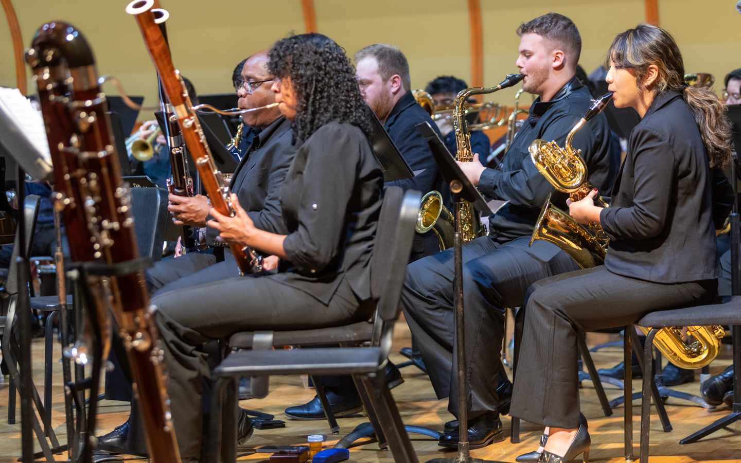 Multiple woodwind players in an ensemble