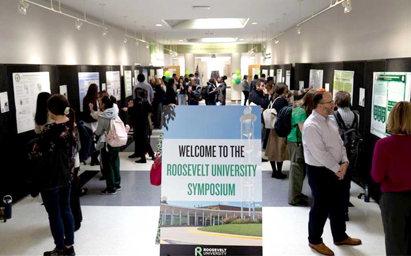 visitors browsing poster presentations