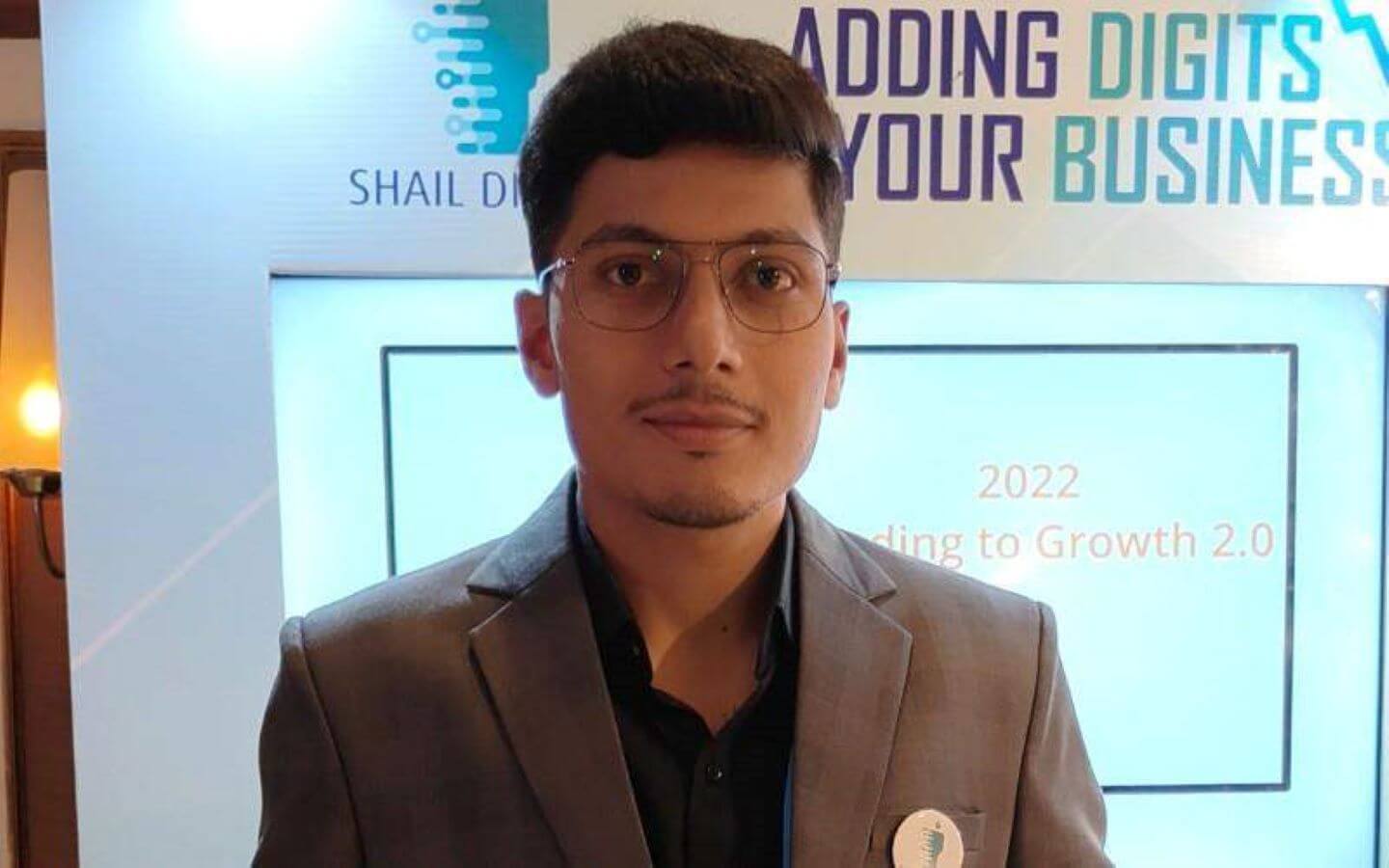  Avinash Khamitkar wearing a suit coat