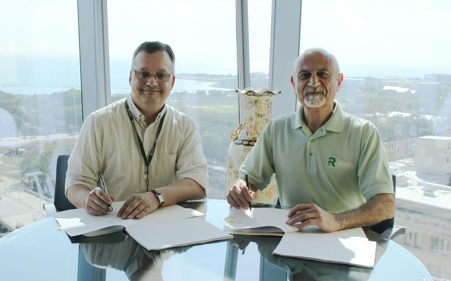 Roosevelt President Ali Malekzadeh and Roosevelt Adjunct Faculty Organization President Joseph Fedorko