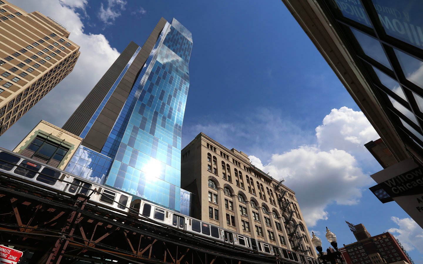 Looking up at Wabash Building from Wabash Avenue beneath the El tracks