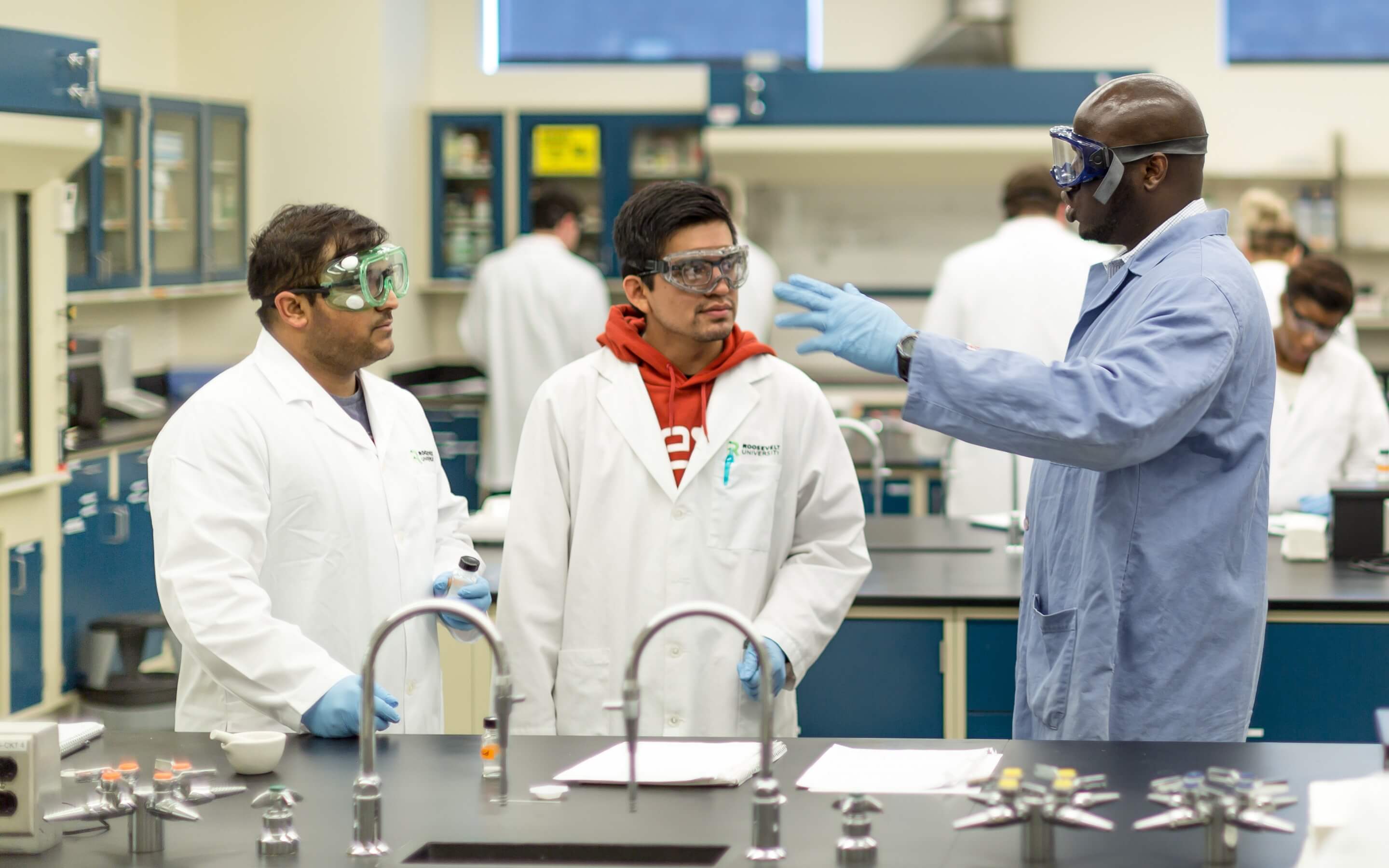 Students and faculty in science lab