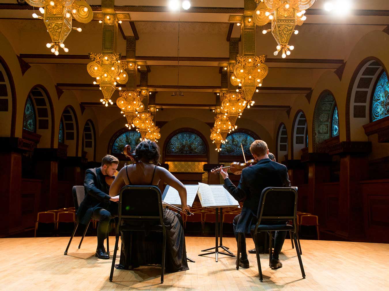 strings students rehearsing in Ganz Hall