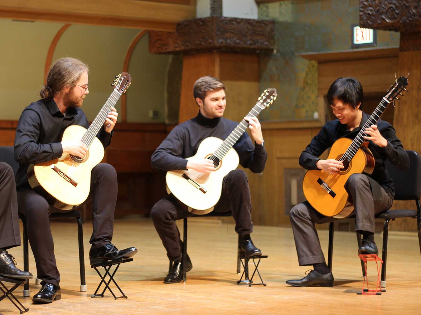 Classical guitar students giving a recital