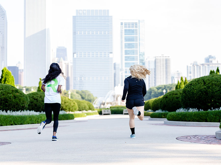Female students jogging - Life in the Loop