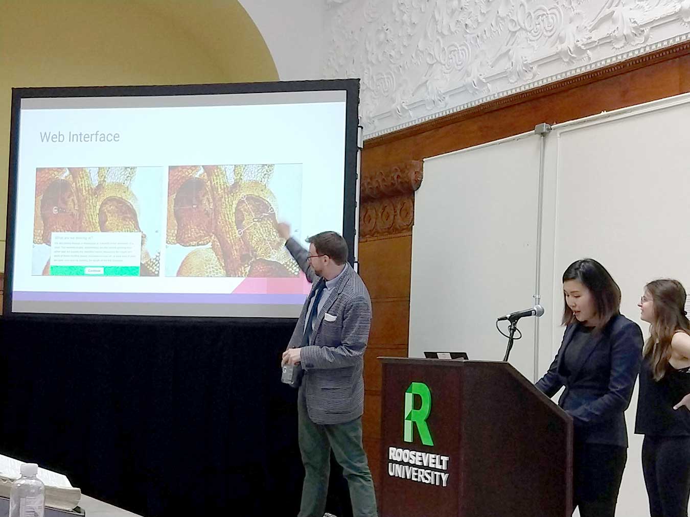 students presenting at research symposium
