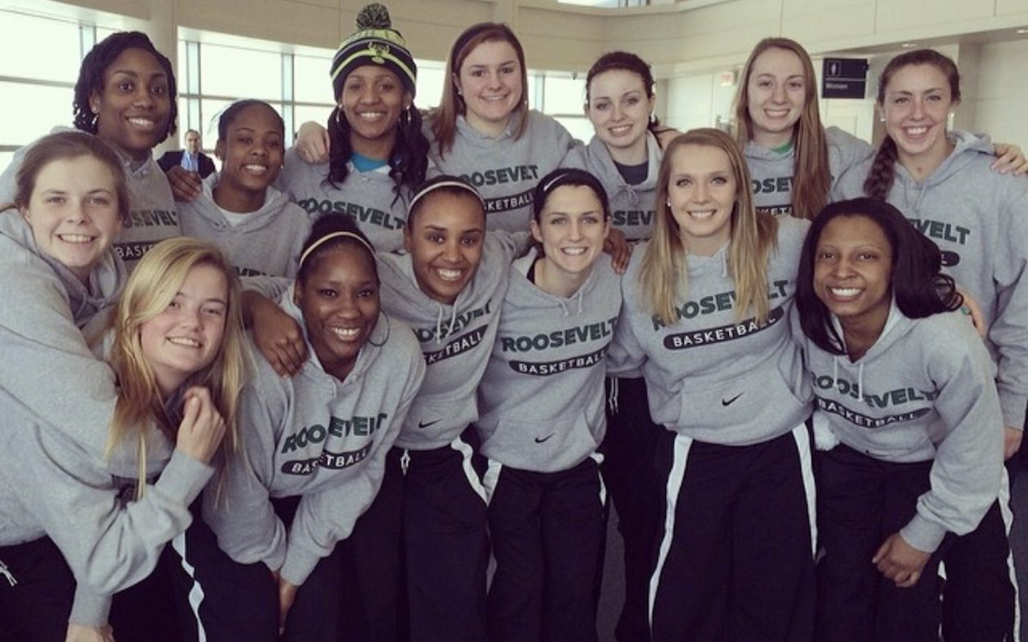 Rebecca Moss and the Roosevelt University women's basketball team