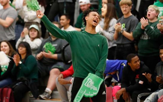 student cheering in gym