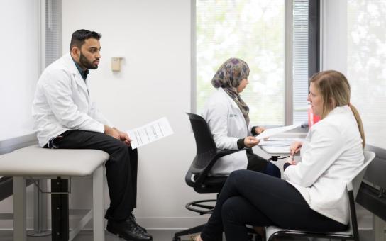 Pharmacy students in patient care lab