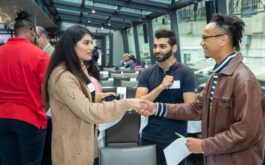 Students networking at an outdoor event