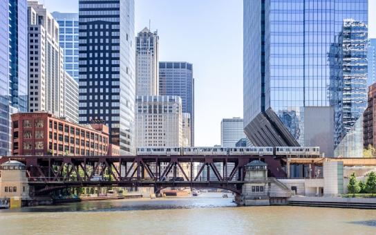 Chicago Skyline of the River and a Train Passing by