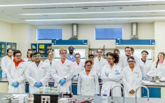 Group of students participating in science lab