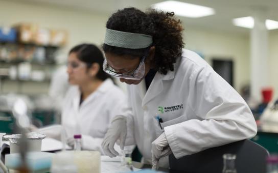 Student participating in science labs