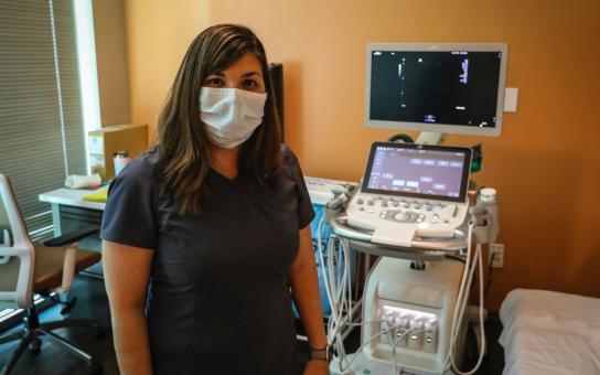 Medical Technician with equipment in hospital 