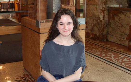 Student with scale model of the Roosevelt University Chicago campus