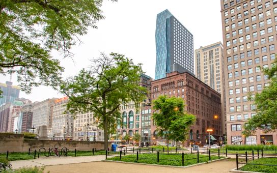 A fall cityscape view of the Chicago campus featuring the Wabash and Auditorium buildings.