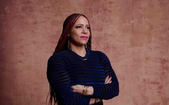  Nikole Hannah-Jones standing with arms crossed