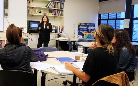 Professor Jin-Ah Kim teaching a class in the College of Education
