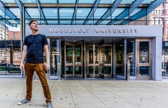 Student standing outside Wabash entrance