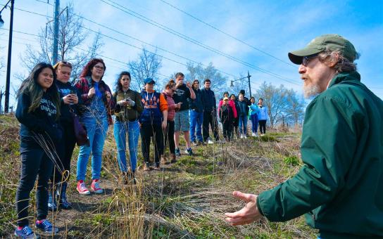 ACP/SUST 250 — The Sustainable University students cleaning up litter on the banks of Bubbly Creek at Canal Origins Park in Chicago.