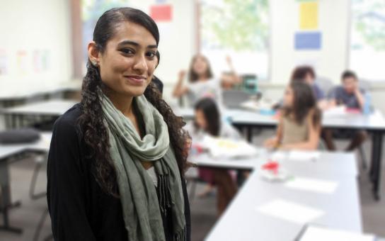 Education student in front of classroom