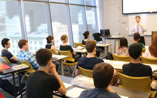 Professor speaking to a classroom of student