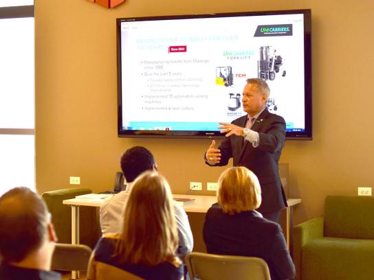 Jim Radous speaking to a business seminar